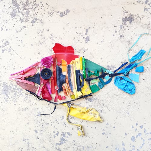 Preview: plastic fish ,beach art made from trash pollution found on the beach