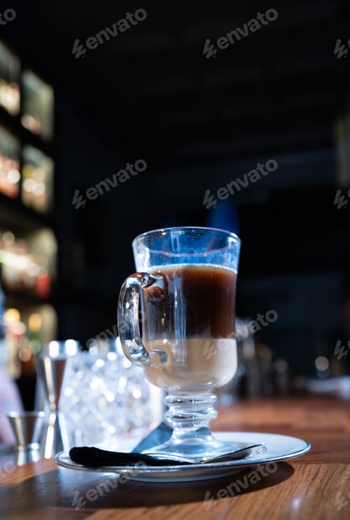 Preview: Coffee cup on a saucer at an outdoor night cafe