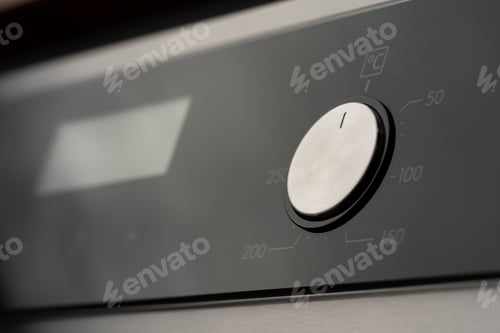 Preview: Modern oven mode control button close up