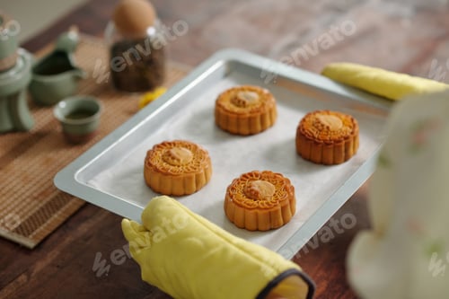 Preview: Woman Baking Moon Cakes At Home