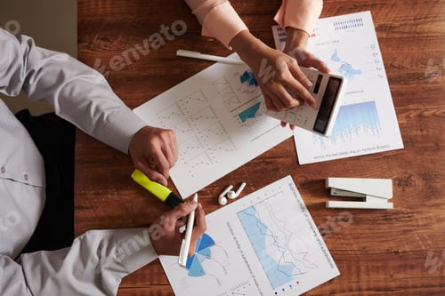 Preview: Colleagues Discussing Sum of Expenses