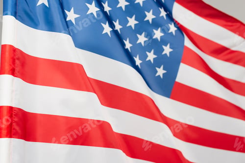 Preview: close up of national flag of america with stars and stripes