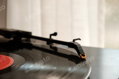 Preview: Close-up of turntable playing a record.
