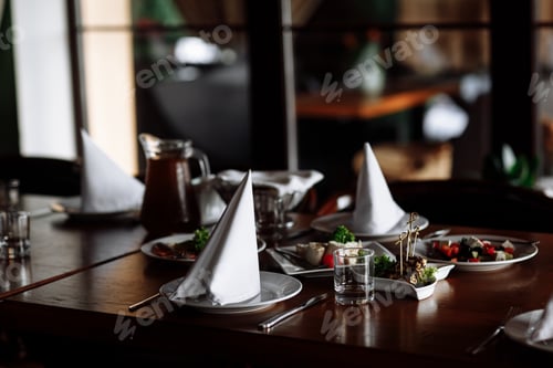 Preview: Served restaurant table. selective focus. noise is present.