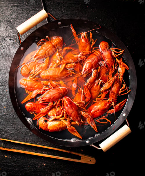 Preview: Boiled crayfish in a pot of water.