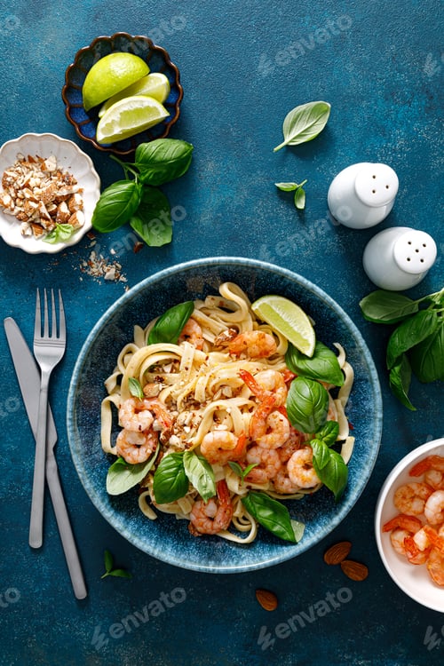 Preview: Pasta with shrimps and basil, top view