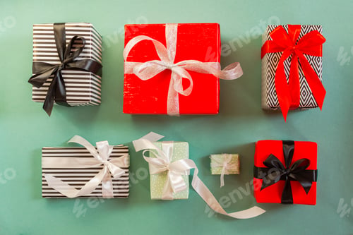 Preview: Christmas gifts on a green background