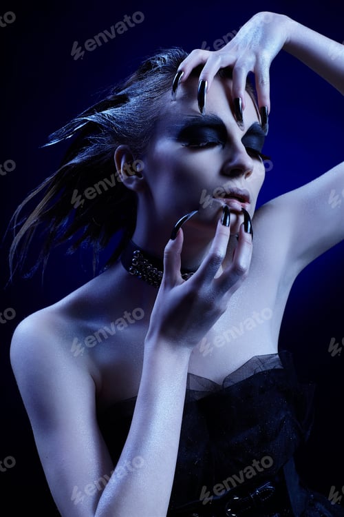 Preview: Cold-Tint Portrait Of Beautiful Girl With Bird Of Prey Make-Up, Hair-Do And Manicure