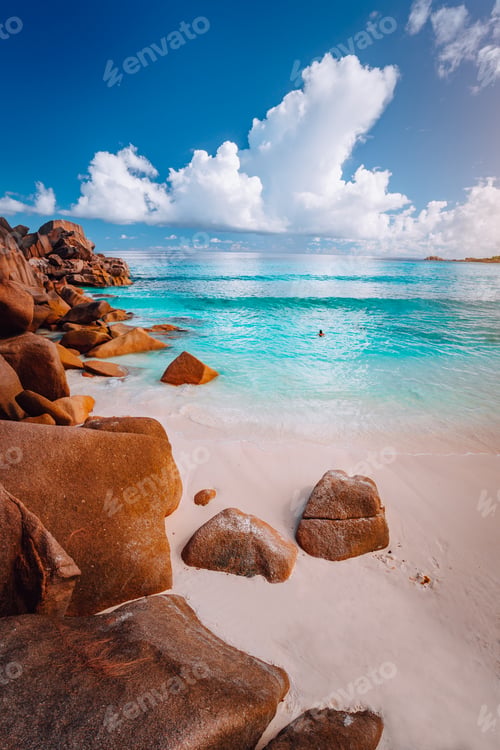 Preview: Idyllic scenery sea cloudscape of Grand Anse beach in La Digue island, Seychelles. Nature background