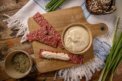 Preview: Top view of bowl of hummus