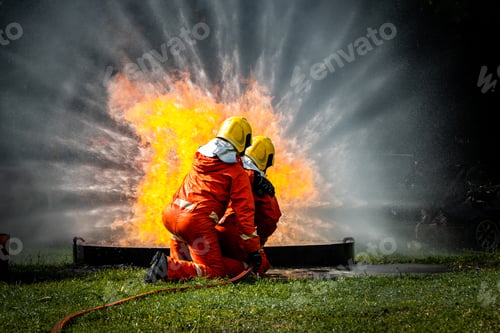 Preview: Firefighter Concept. Fireman using water and extinguisher to fighting with fire flame.
