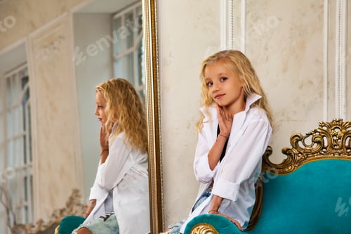 Preview: Girl with Blonde Hair Posing in Oversized Shirt