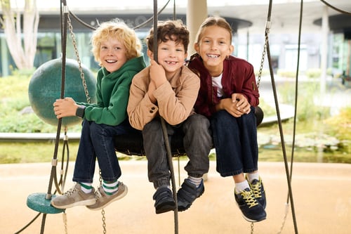 Preview: Joyful childhood moments in autumn at a lively playground with friends