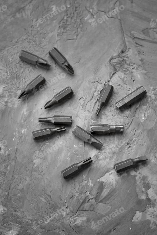 Preview: Set of screwdriver bits, concrete background