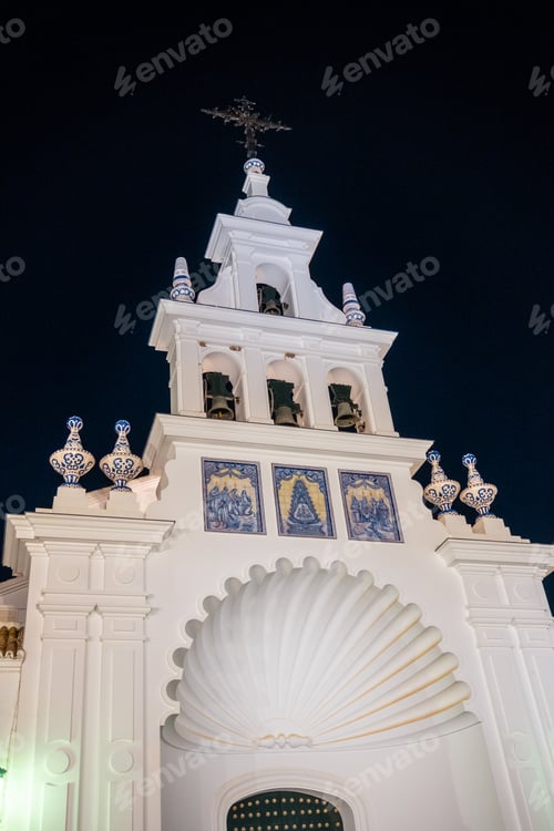 Preview: White facade of the sanctuary of Rocio in the fiesta del rocio at night, Huelva. Andalusia