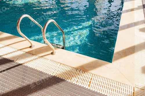 Preview: Grab bars ladder in the blue swimming pool