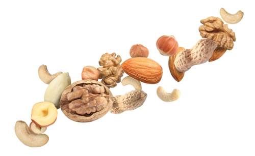 Preview: Mix of nuts in air on white background