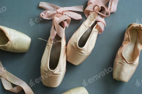 Preview: Close up old used ballet pointe shoes.