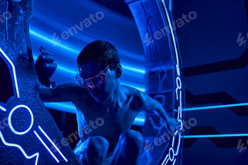 Preview: future science progress, extraterrestrial humanoid in goggles sitting in experimental device in lab