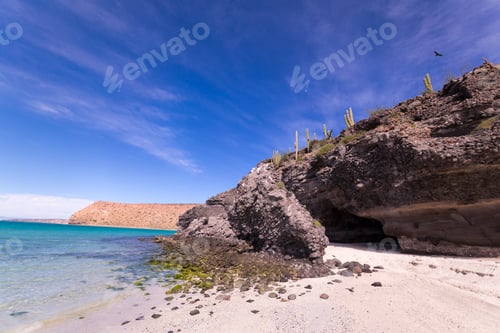 Preview: Sandy beach and rocky cliff, Isla Espiritu, Mexico.