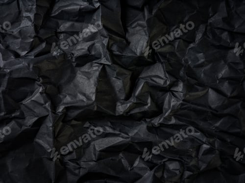 Preview: background of crumpled black paper. Element for design.