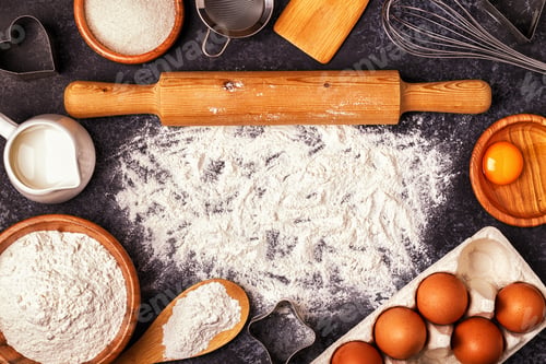 Preview: Ingredients for baking - flour, wooden spoon, rolling pin, eggs