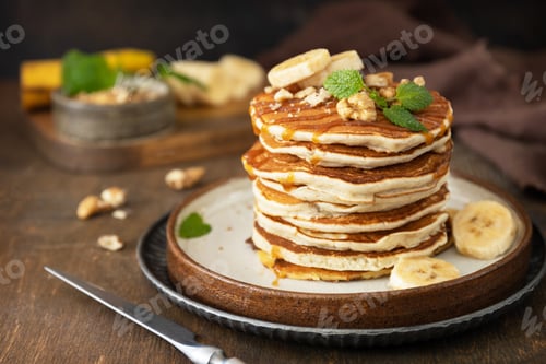 Preview: Delicious homemade banana pancakes with nuts and caramel