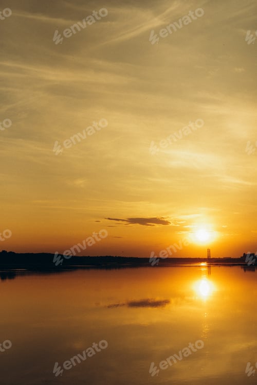 Preview: orange sunset on the river with silhouettes