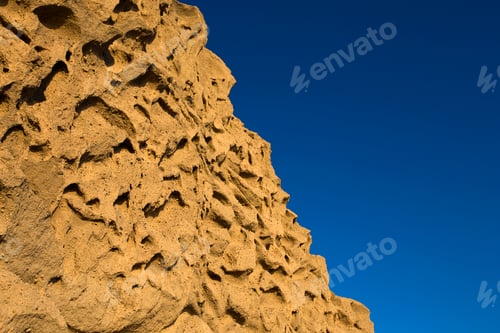 Preview: Closeup of Vlychada beach volcanic ash sand rock formation on Santorini island in Greece