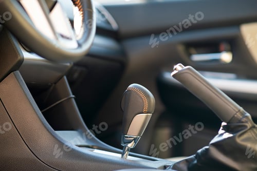 Preview: Closeup of car automatic transmission gear stick. Detail of vehicle interior