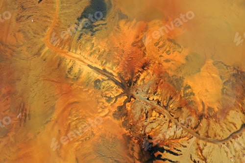 Preview: Aerial view of surreal natural patterns of gold cyanide leaching flowing into decanting lake