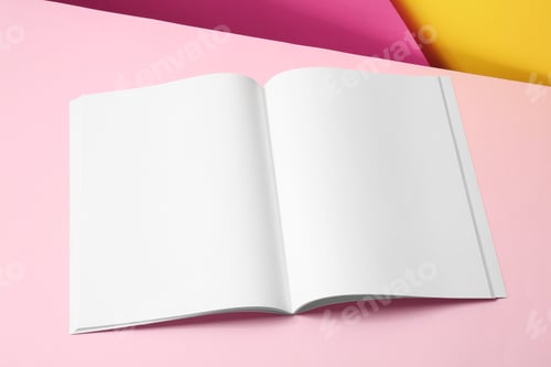 Preview: Empty book pages on color background. Mockup for design