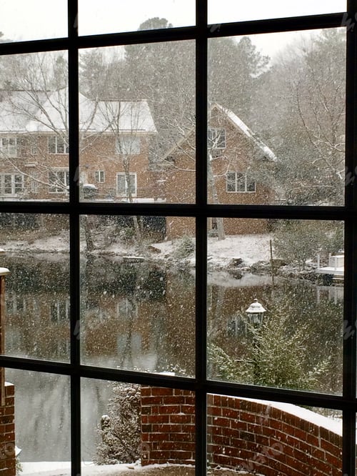 Preview: Enjoying a beautiful snowy day through the window.