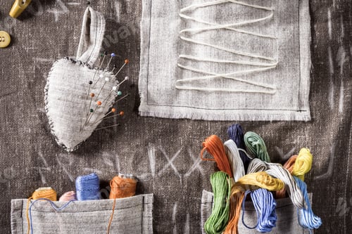 Preview: Colored threads and needles in vintage mat tailor