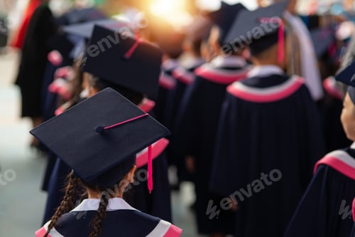 Preview: The back of the graduates are walking to attend the graduation ceremony at the university,