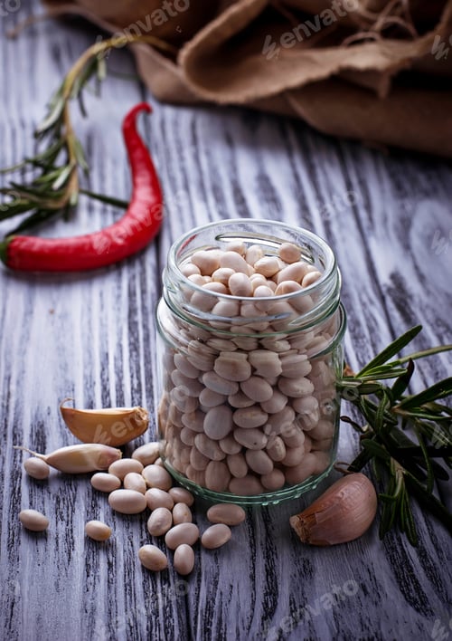 Preview: White dry beans in jar.