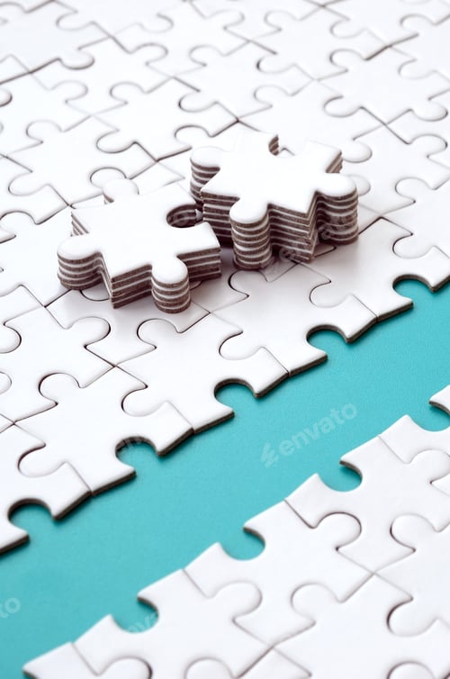 Preview: The blue path is laid on the platform of a white folded jigsaw puzzle. The missing elements of