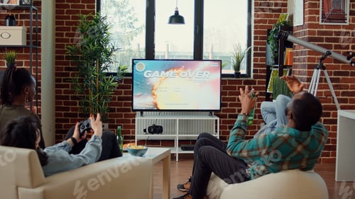 Preview: Angry friends losing video games competition on tv console