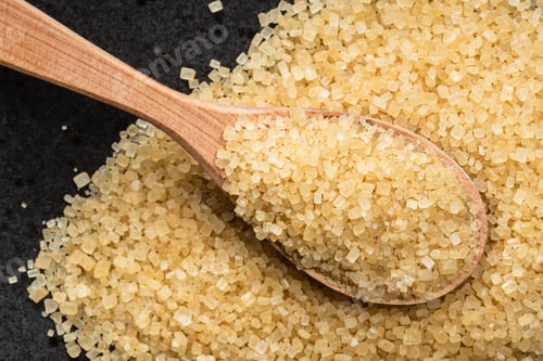 Preview: spoon with demerara brown cane sugar on black