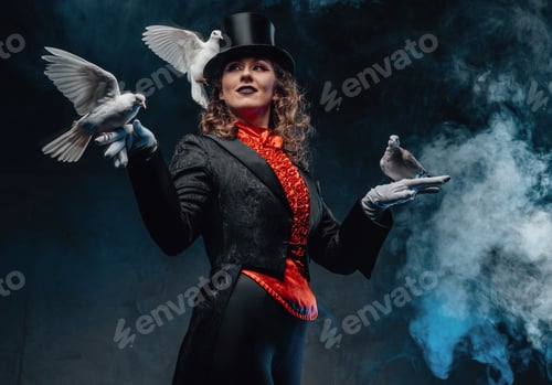 Preview: Elegant actress wearing dark clothing with trained doves in smoke