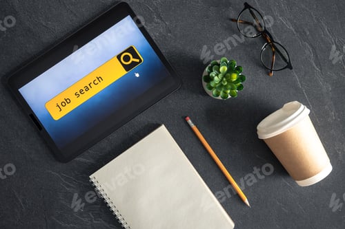 Preview: Top view of digital tablet with search job on screen on a table.
