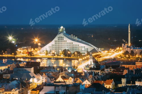 Preview: Riga, Latvia. Aerial View Of Cityscape In Summer Evening Or Nigh