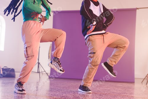 Preview: Image of low section of diverse female and male hip hop dancers in studio