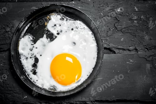 Preview: Fried egg in a frying pan.