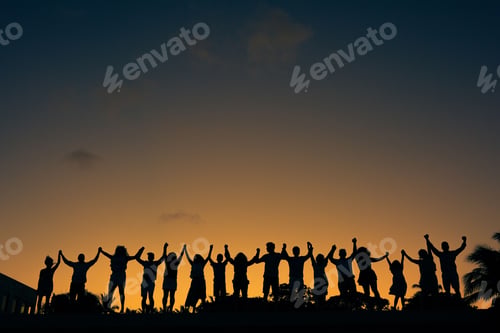 Preview: Beautiful shot of silhouettes of a group people during the sunset