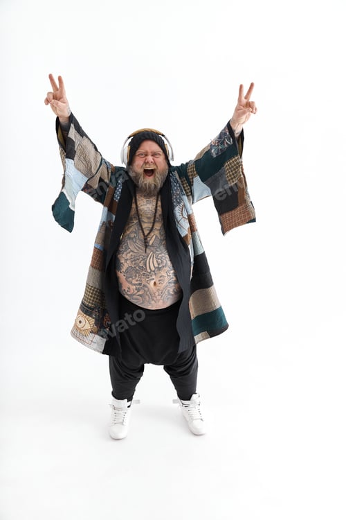 Preview: Fat stylish bearded tattoed caucasian man with big belly is posing and dancing wearing ethnic kimono