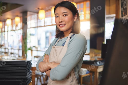 Preview: Waitress, portrait and Asian woman with arms crossed at cafe, coffee shop or store. Face, smile and