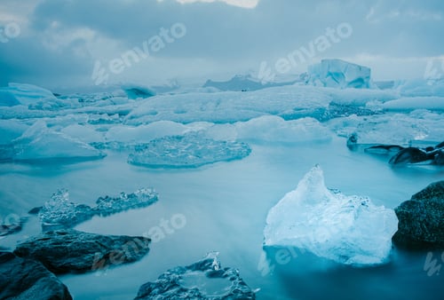 Preview: Majestic icebergs in tranquil blue water