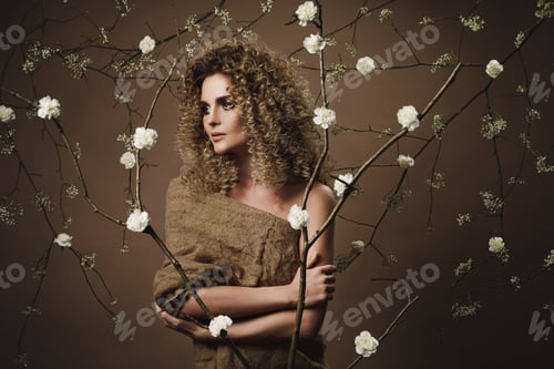 Preview: Portrait of lovely young woman with Afro hairstyle and beautiful make-up