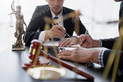 Preview: Businessman and lawyer discuss the contract document. Treaty of the law. Sign a contract business.